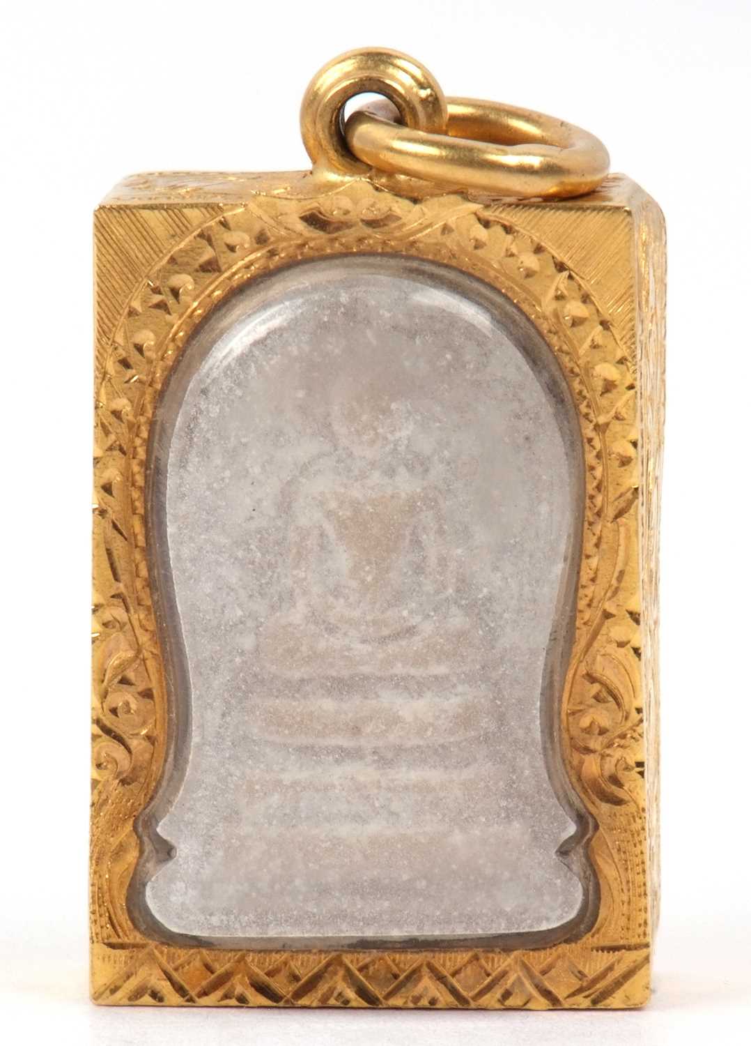 Lot 246 - A carved stone religious pendant depicting a...