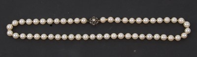 Lot 260 - A cultured pearl necklace, a single row of...