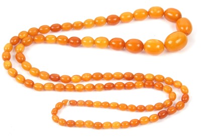 Lot 268 - An amber bead necklace, butterscotch colour, a...