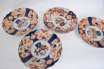 Lot 24 - Four Japanese porcelain Imari style dishes...