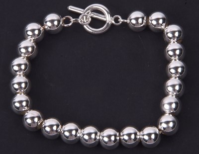 Lot 310 - A modern Italian 925 stamped beaded bracelet,...