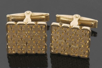 Lot 377 - 18ct gold cufflinks, the off-square patterned...