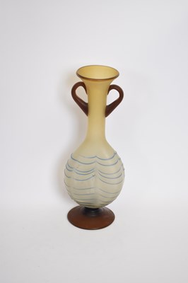 Lot 43 - Art glass vase of dimpled shape with loop...