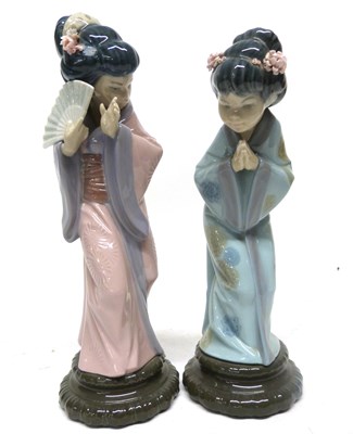 Lot 44 - Two Lladro figures of Japanese children,...