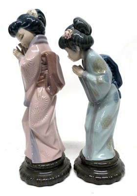 Lot 44 - Two Lladro figures of Japanese children,...