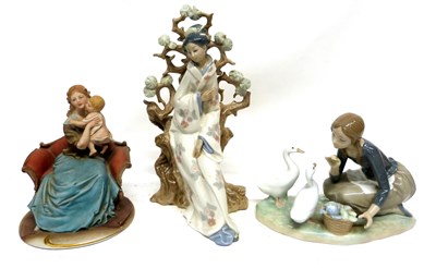 Lot 45 - Lladro figure of a Japanese lady seated...