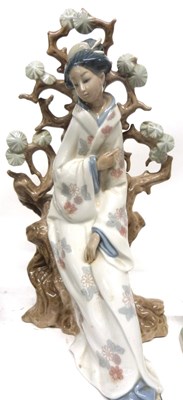 Lot 45 - Lladro figure of a Japanese lady seated...