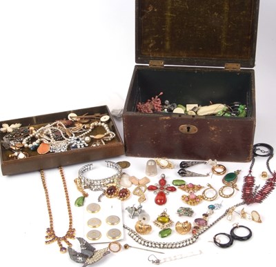 Lot 350 - An antique leather jewel box containing...