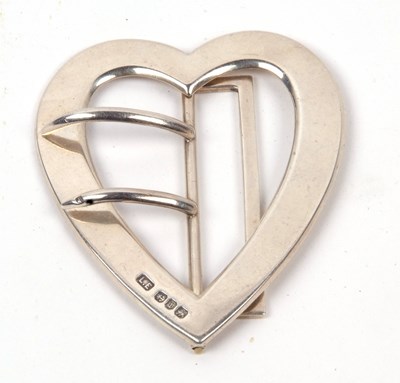 Lot 362 - A hallmarked silver heart shaped buckle,...