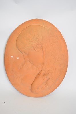 Lot 60 - Terracotta plaque of young girl and child,...