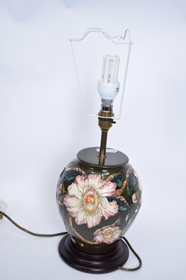 Lot 65 - Moorcroft table lamp with tube lined floral...