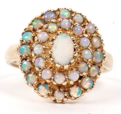 Lot 101a - 9ct opal cluster ring, the central oval opal...