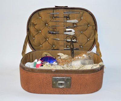 Lot 174 - A leather sewing box and mother of pearl...