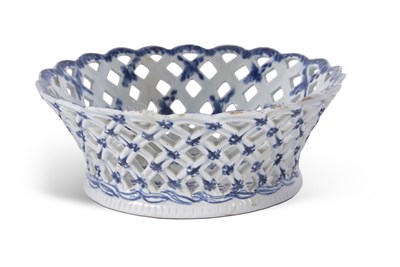 Lot 132 - A large Bow porcelain blue and white basket...