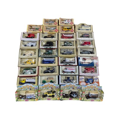 Lot 201 - A mixed lot of various boxed die-cast vehicles,...