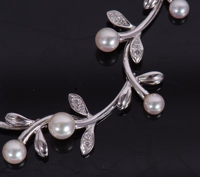 Lot 393 - Mikimoto cultured pearl and diamond set...