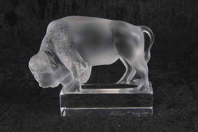 Lot 16 - Lalique model of a Bison on rectangular clear...