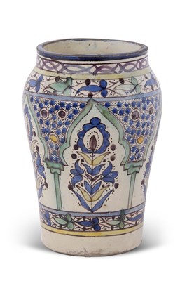 Lot 147 - An Iznik style vase with polychrome decoration,...