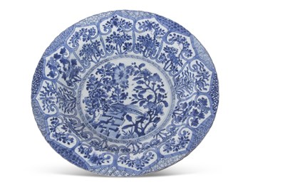 Lot 159 - A large Chinese porcelain dish with a blue and...
