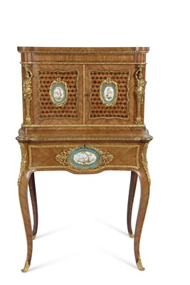 Lot 491 - A French walnut porcelain and ormolu desk with...