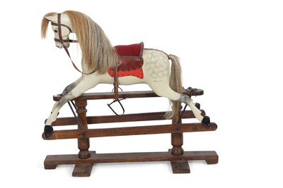 Lot 489 - Dapple grey rocking horse of traditional style...