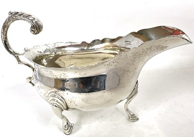 Lot 12 - An early 20th Century silver sauce boat of...