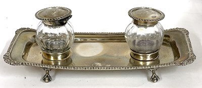 Lot 15 - An early 20th Century silver double ink stand...