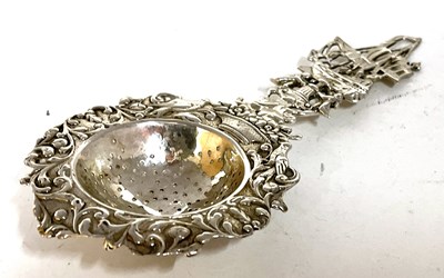 Lot 23 - An antique Dutch silver sifter spoon with...