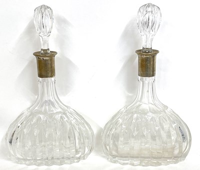 Lot 201 - A pair of mallet shaped crystal decanters and...