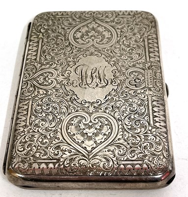 Lot 56 - A Victorian card case elaborately engraved...