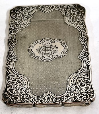 Lot 62 - A Victorian engraved card case with wavy edges,...