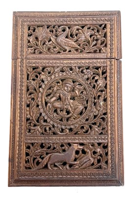 Lot 71 - A finely carved Indian stained sandlewood card...