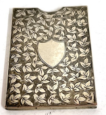 Lot 81 - An Edwardian silver card case foliate engraved...