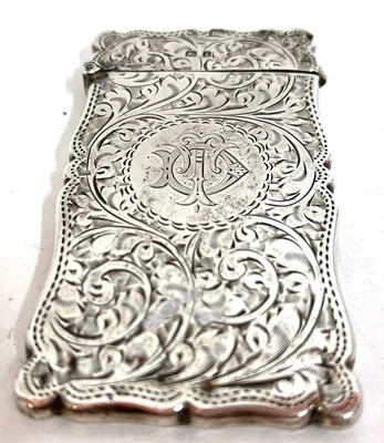 Lot 82 - An Edward VII silver card case elaborately...