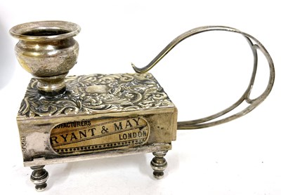 Lot 100 - A vintage brass match box and chamber stick...