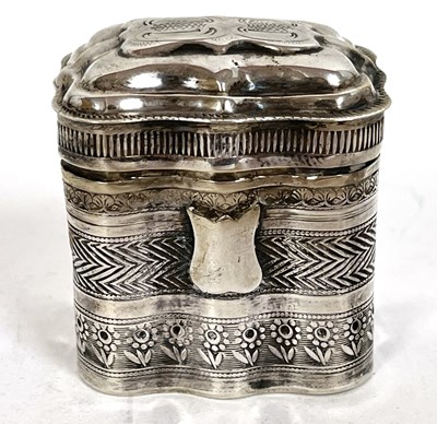 Lot 101 - A continental white metal pill box chased and...