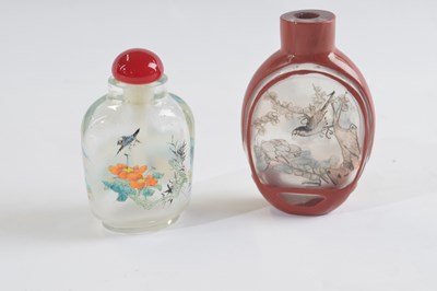 Lot 309 - Small plastic bag containing two snuff bottles,...