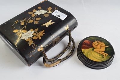 Lot 329 - Japanese wooden purse modelled in relief with...