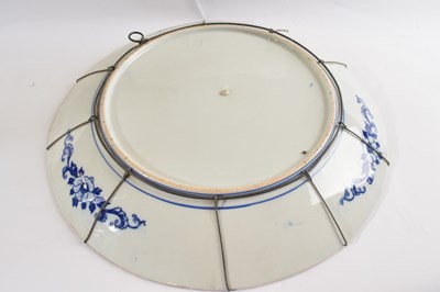 Lot 334 - A large Japanese porcelain charger Meiji...