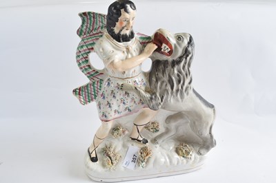 Lot 357 - A Staffordshire group of Sampson and the Lion,...