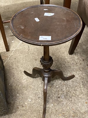 Lot 348 - Reproduction mahogany wine table raised on...