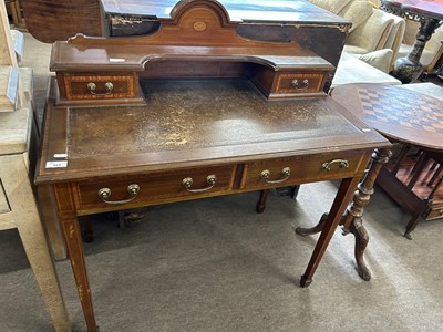 Lot 555 - An Edwardian mahogany and inlaid writing table...