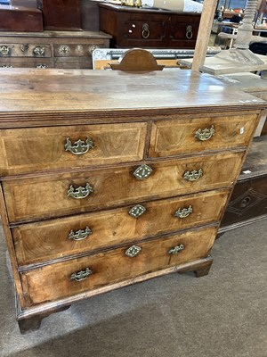 Lot 566 - An 18th Century walnut chest of two short over...