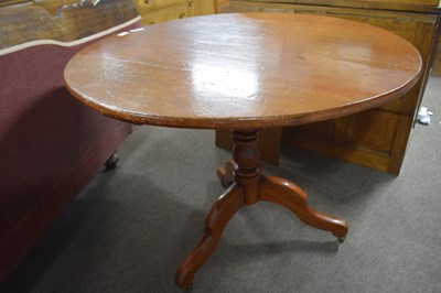 Lot 569 - A 19th Century cherry pedestal supper table...