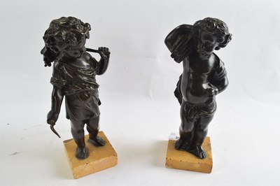 Lot 391 - Two bronze figures of putti emblematic of...