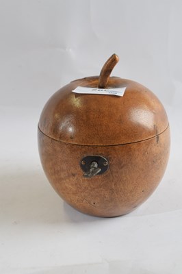 Lot 392 - Wooden tea caddy shaped as an apple with a key
