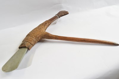 Lot 285 - A Papua New Guinea stone bladed axe, with...