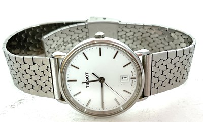 Lot 265 - A stainless steel gents Tissot quartz wrist...