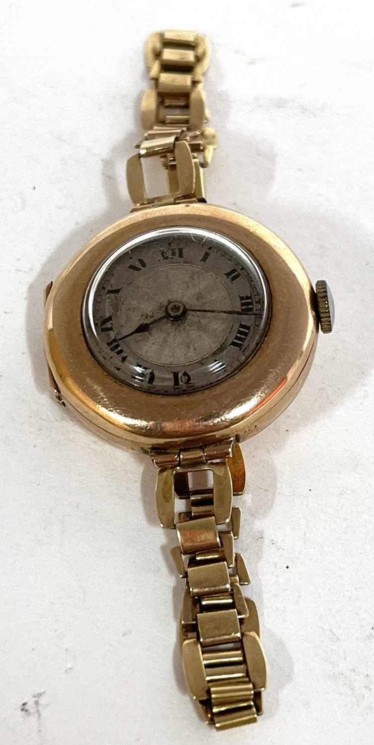 Lot 279 - A 9ct gold ladies wrist watch on a 9ct gold...