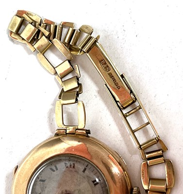 Lot 279 - A 9ct gold ladies wrist watch on a 9ct gold...